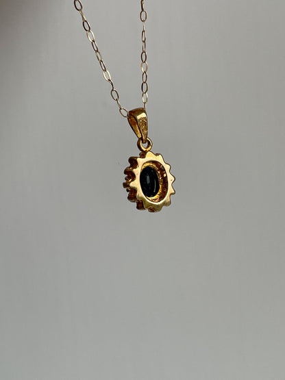 Vintage sapphire and diamond halo cluster pendant and 9ct gold chain